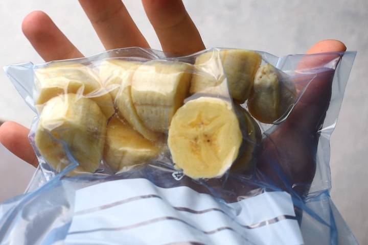Banana Nice Cream (5 Flavor Ideas!) Frozen bananas in a ziploc bag.