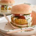 Ranch Chickpea Burgers Ranch chickpea burgers served on a bun with lettuce, tomato, and ranch dressing.