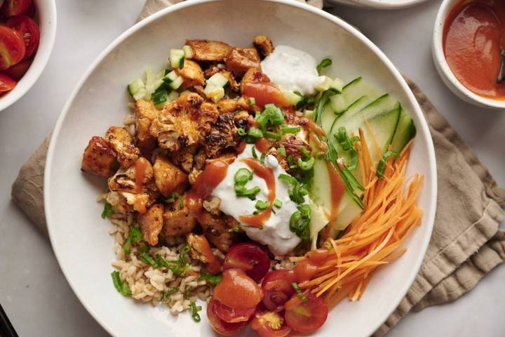 Easy Make Ahead Lunch Bowls For Busy Days Buffalo chicken bowl plated and ready to eat.