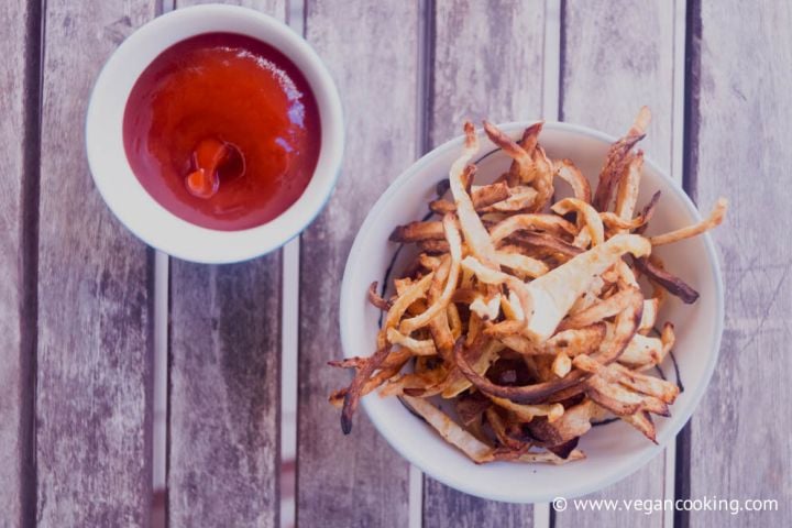 Celeriac Fries (Crispy Celery Root Fries) Celeriac fries baked until crisp and golden brown served in a bowl.