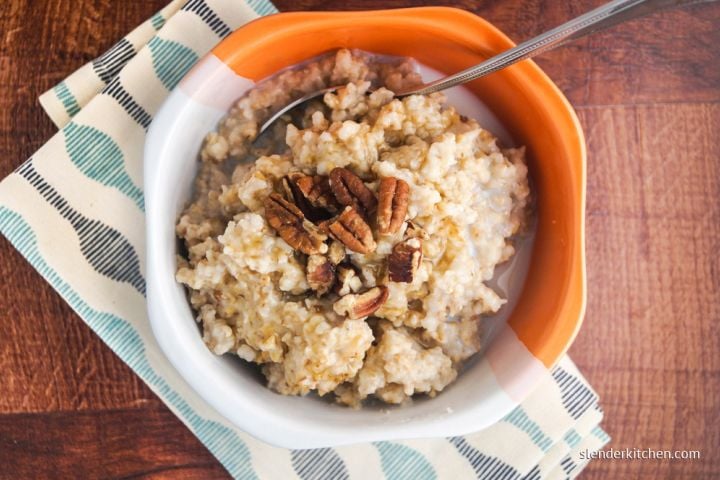 Make Ahead Stovetop Steel Cut Oats Make ahead steel cut oatmeal in a bowl with sliced bananas and nuts.