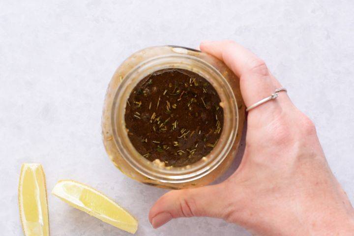 Balsamic vinaigrette in a glass jar. 