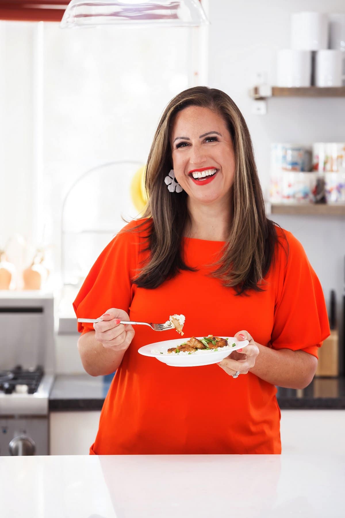 eating teriyaki chicken thighs