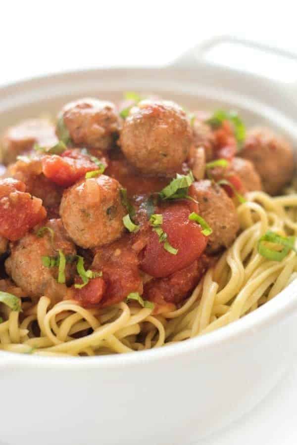 Slow Cooker Turkey Meatballs. Turkey meatballs are slowly cooked in a homemade tomato basil marinara sauce until tender. Made without any breadcrumbs, this meatball recipe is gluten free.