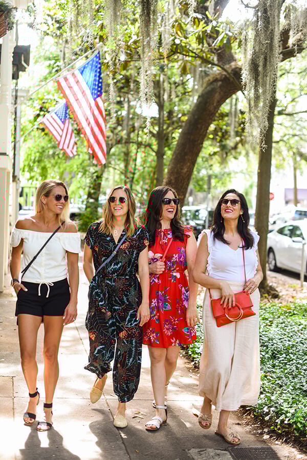 4 girls walking through Savannah Georgia
