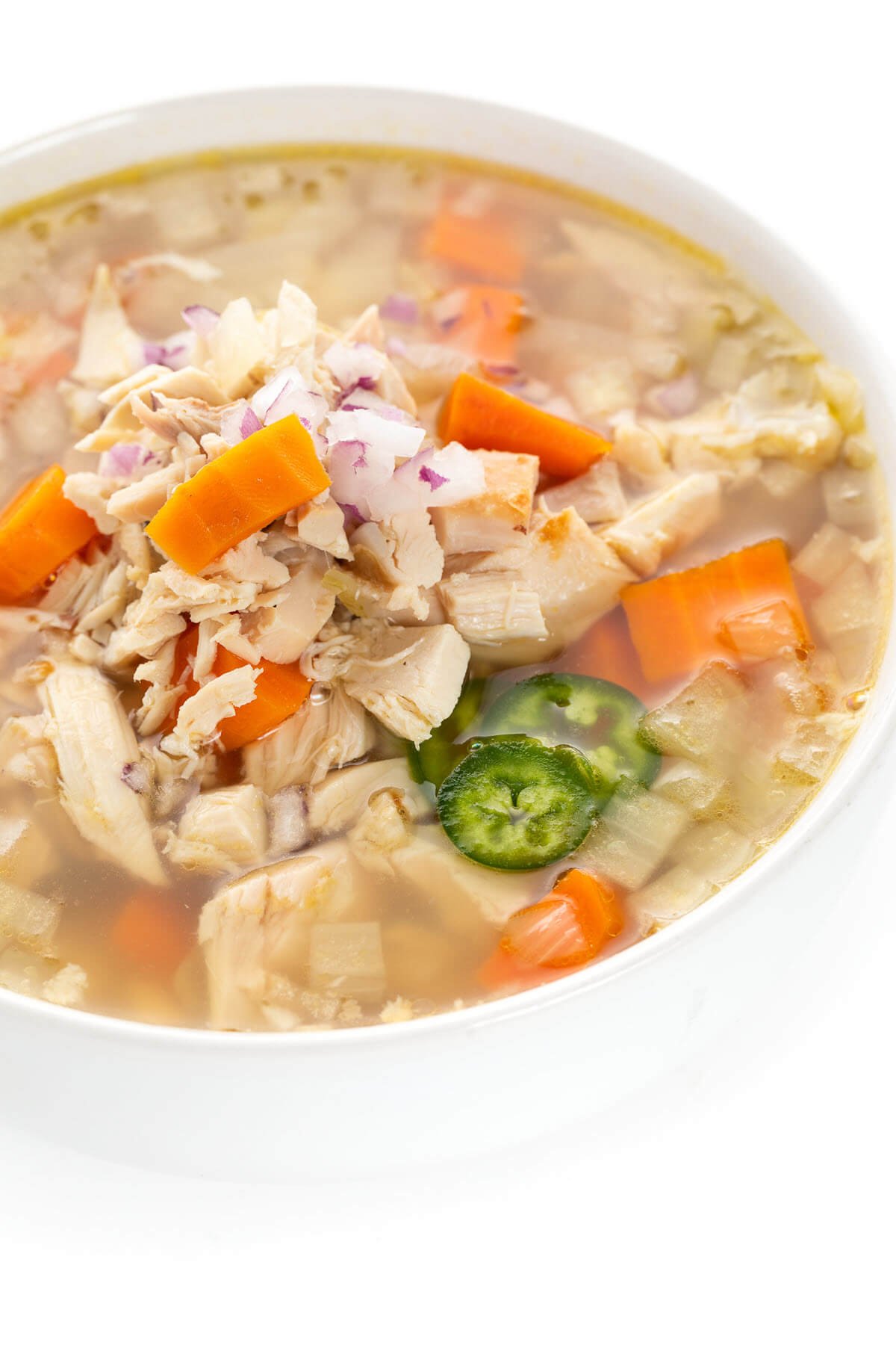 Slow Cooker Caldo de Pollo in a bowl