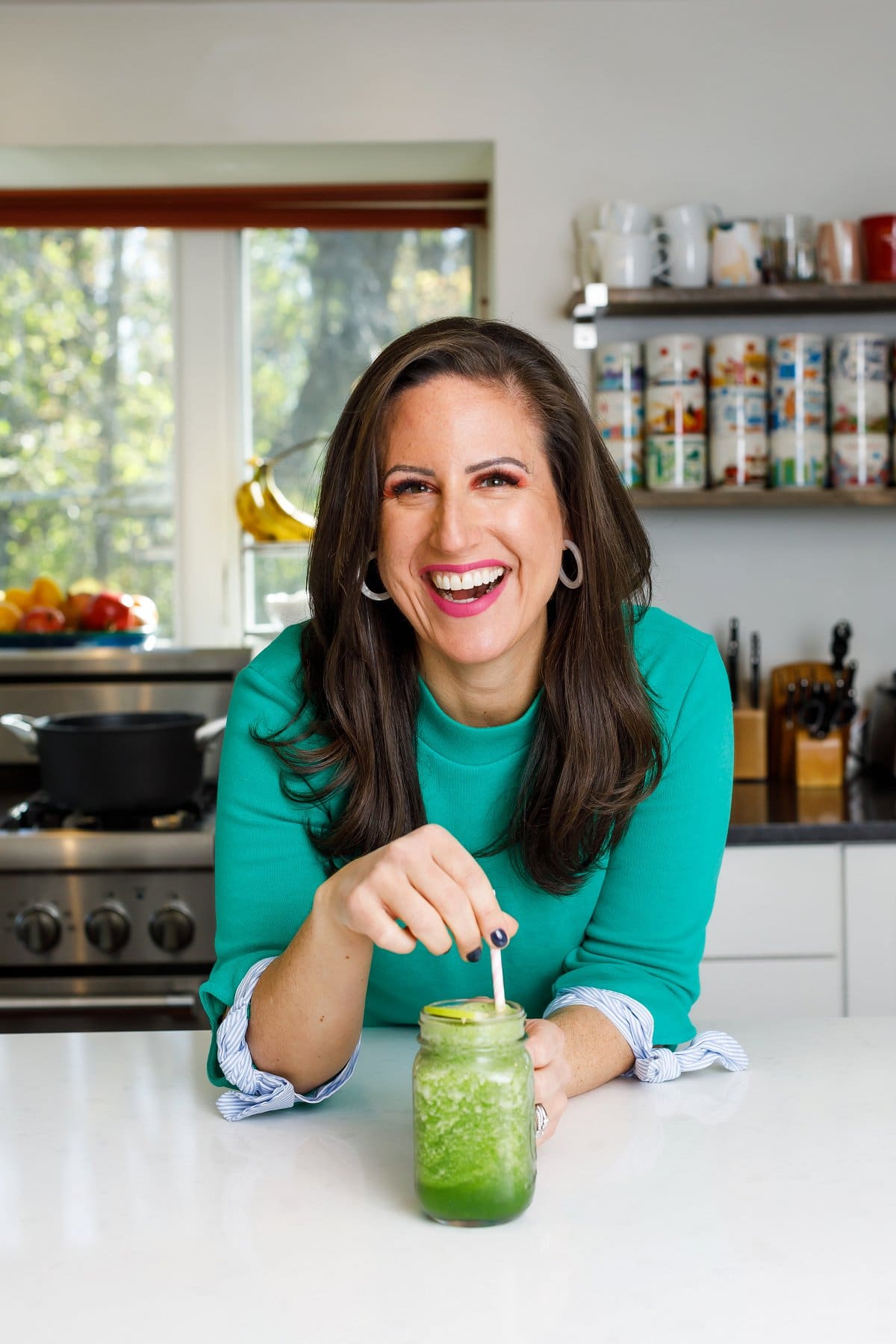 liz drinking a green smoothie