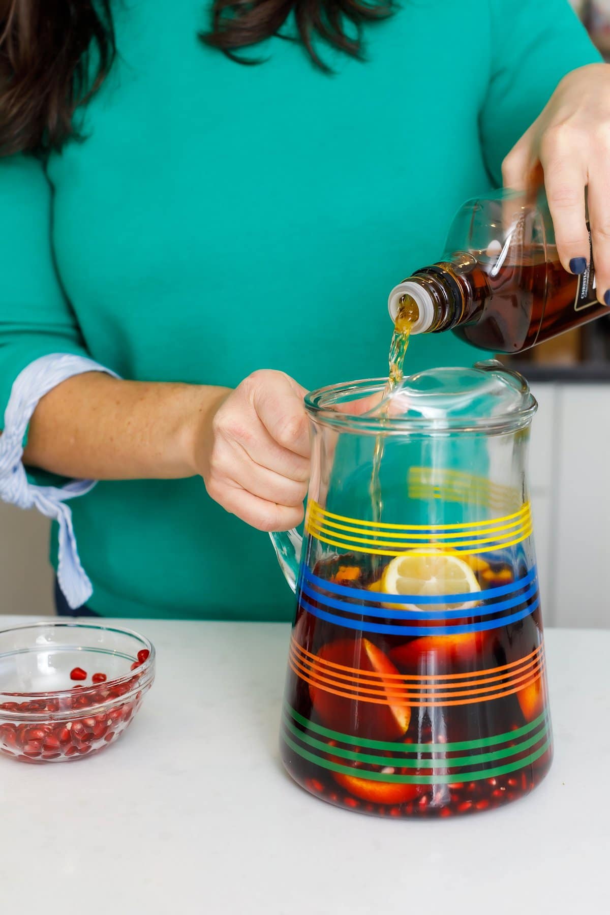 pomegranate sangrias being made