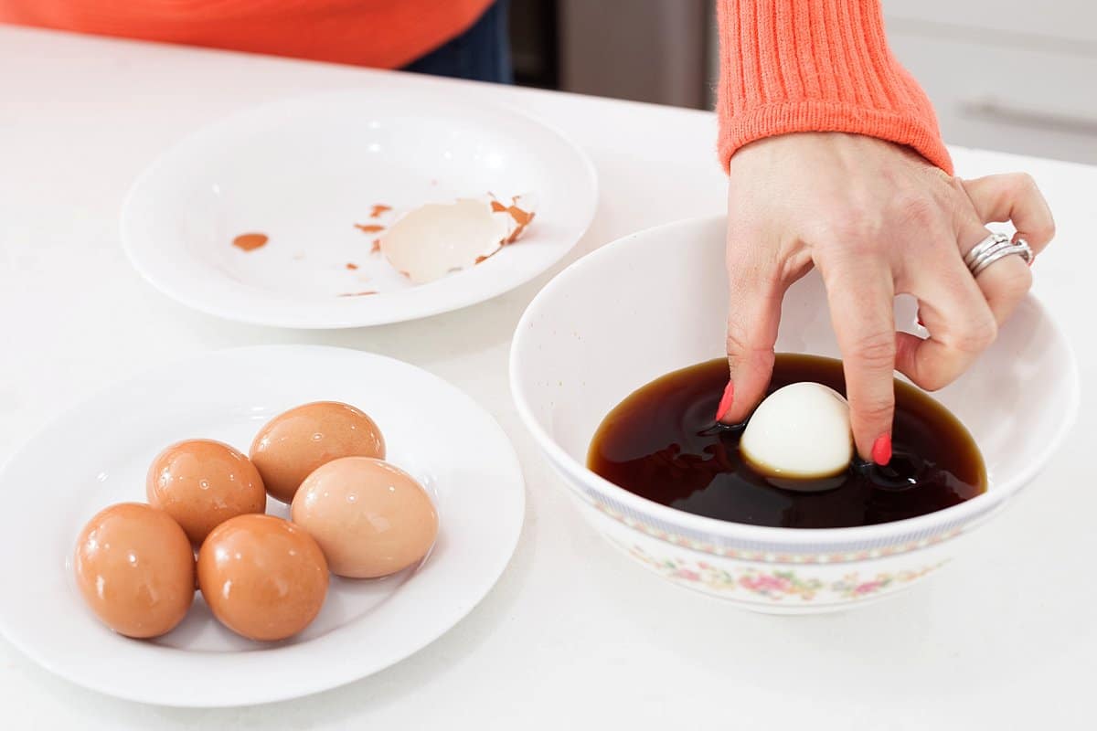 preparing spicy chicken ramen toppings