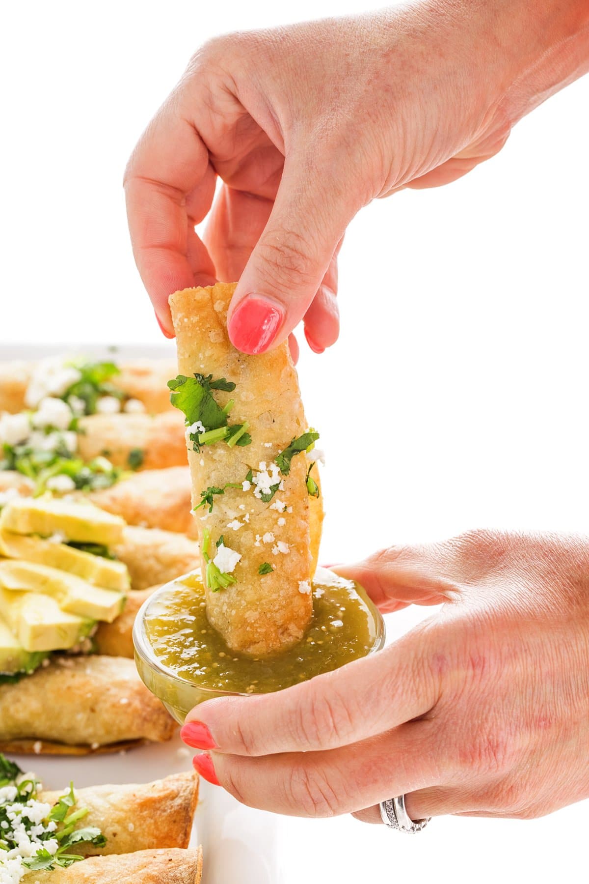 dipping chicken taquitos