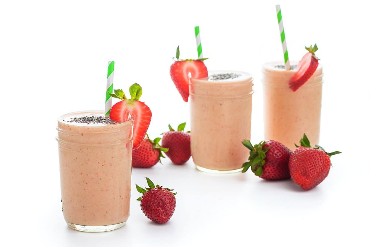 Easy Vegan Smoothie with strawberries around the picture