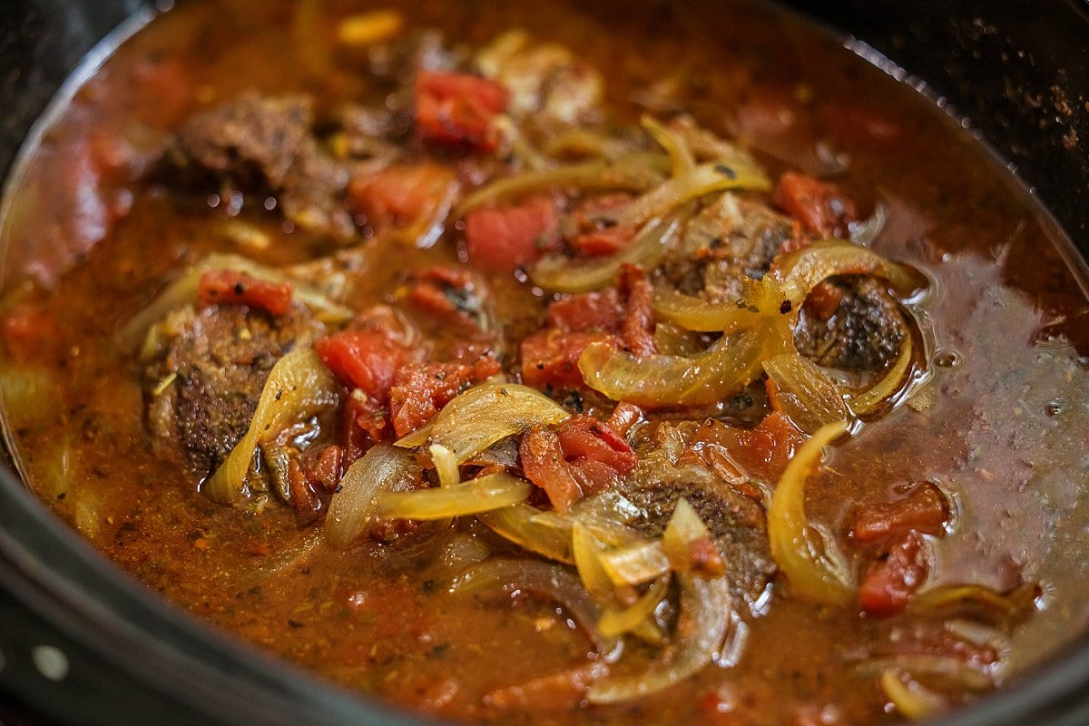 close up of slow cooker shredded beef