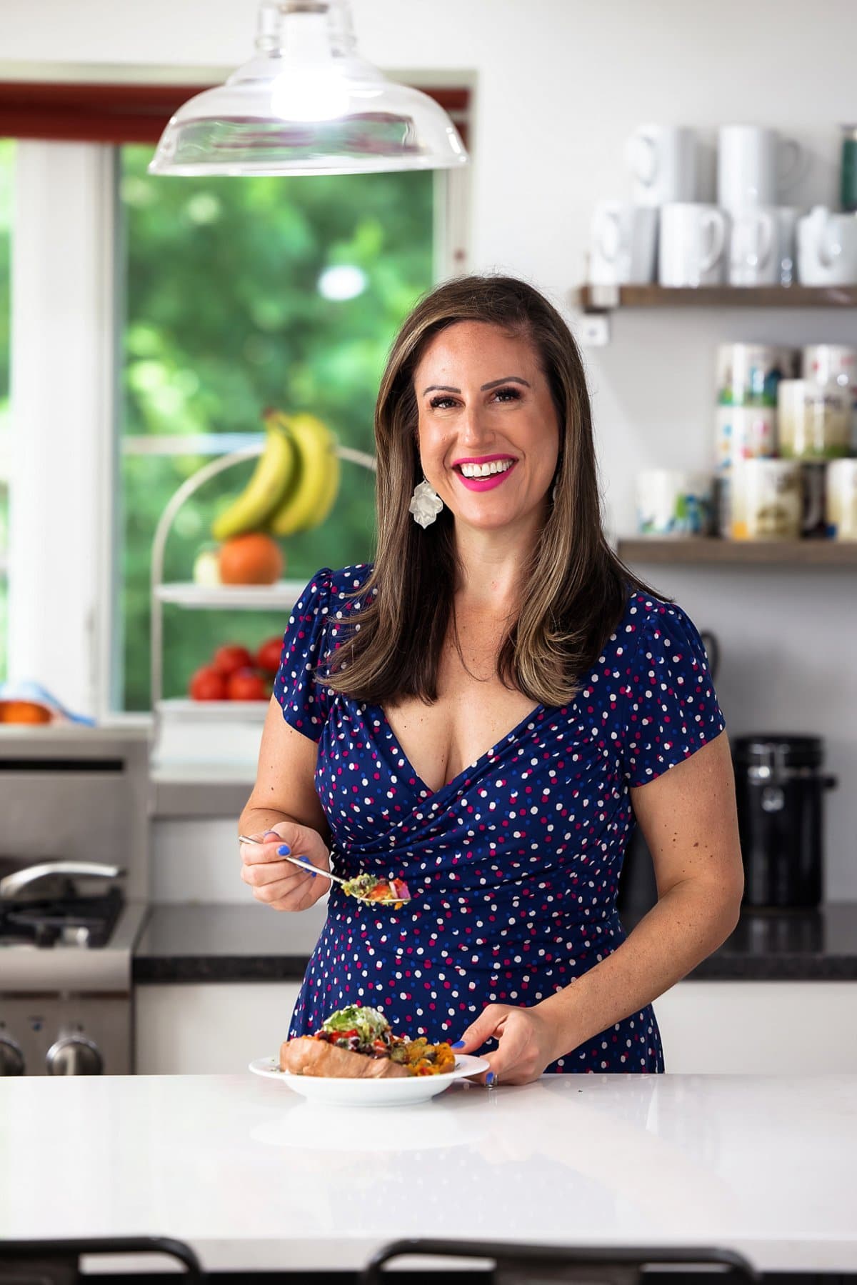 Liz with black bean stuffed sweet potatoes