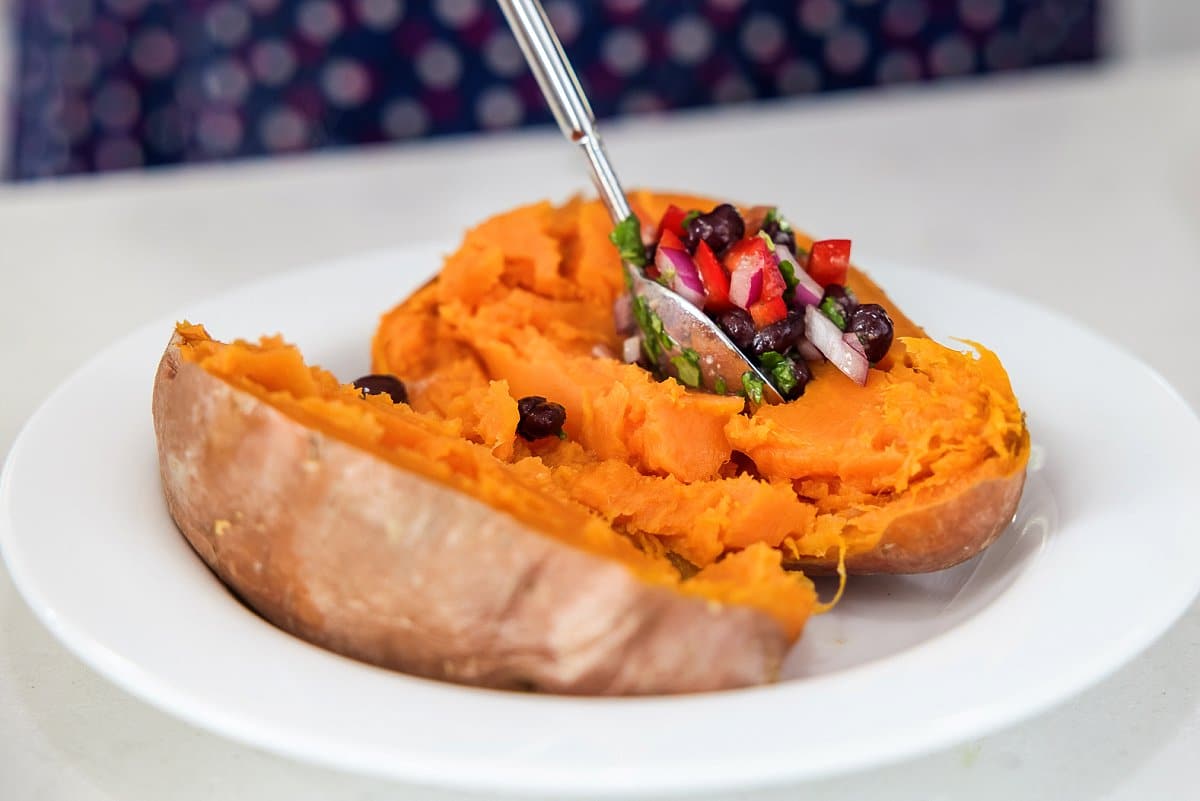 splitting cooked sweet potato