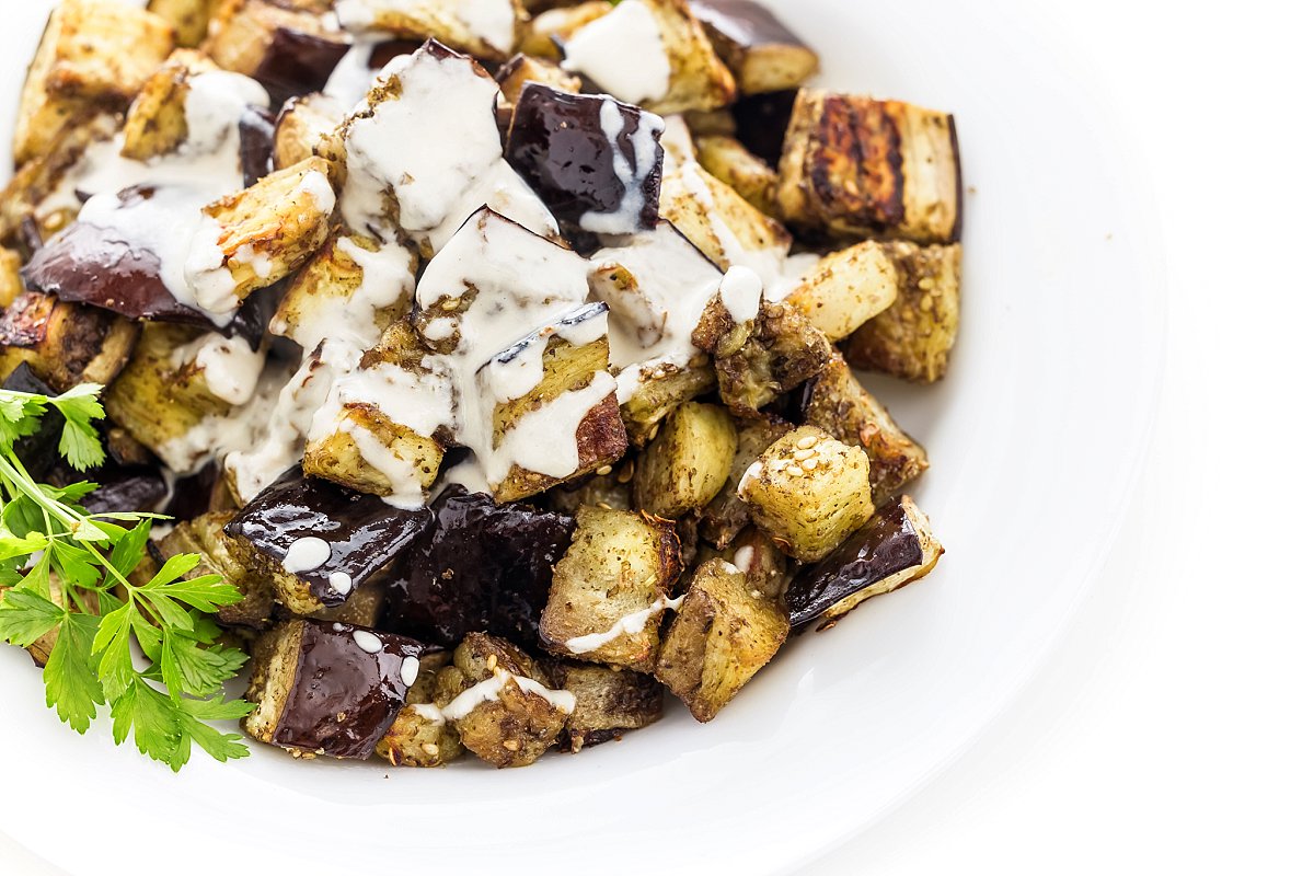 Roasted eggplant with za'atar and tahini sauce.