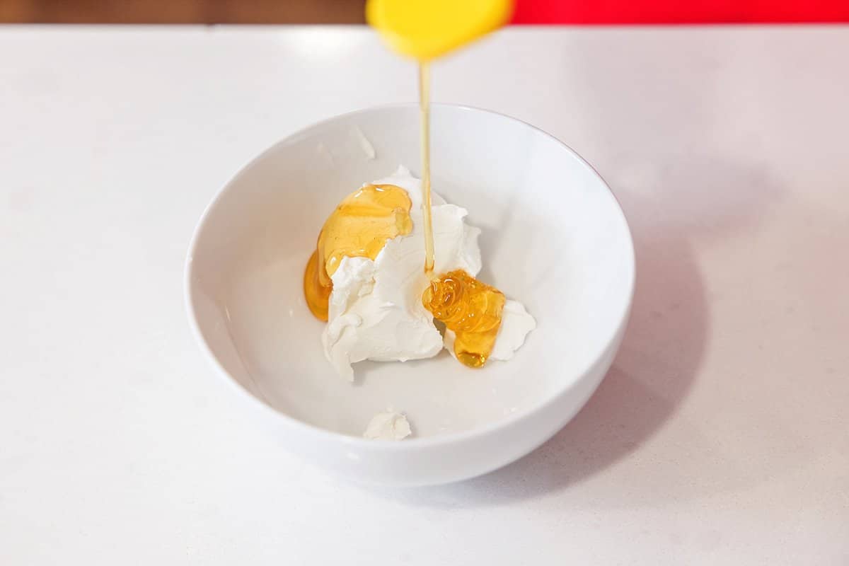 Adding honey to goat cheese