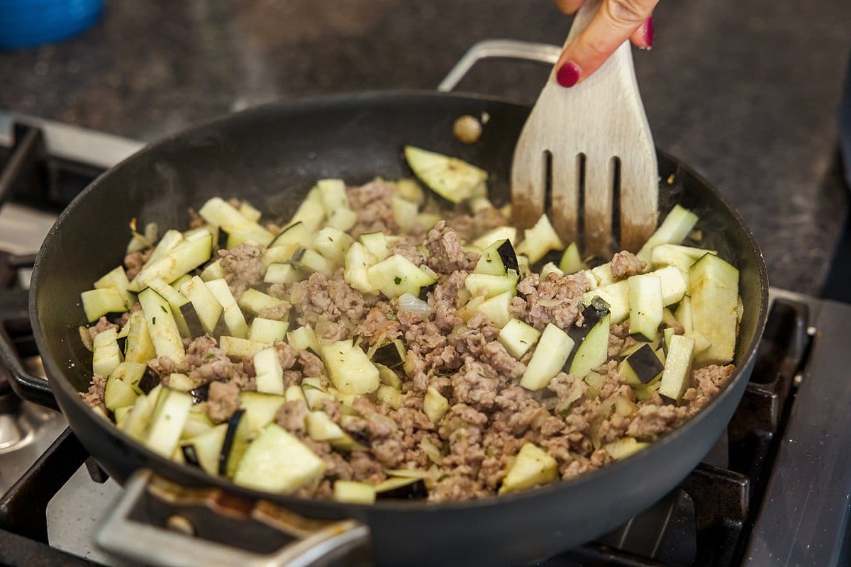 Eggplant added to pan
