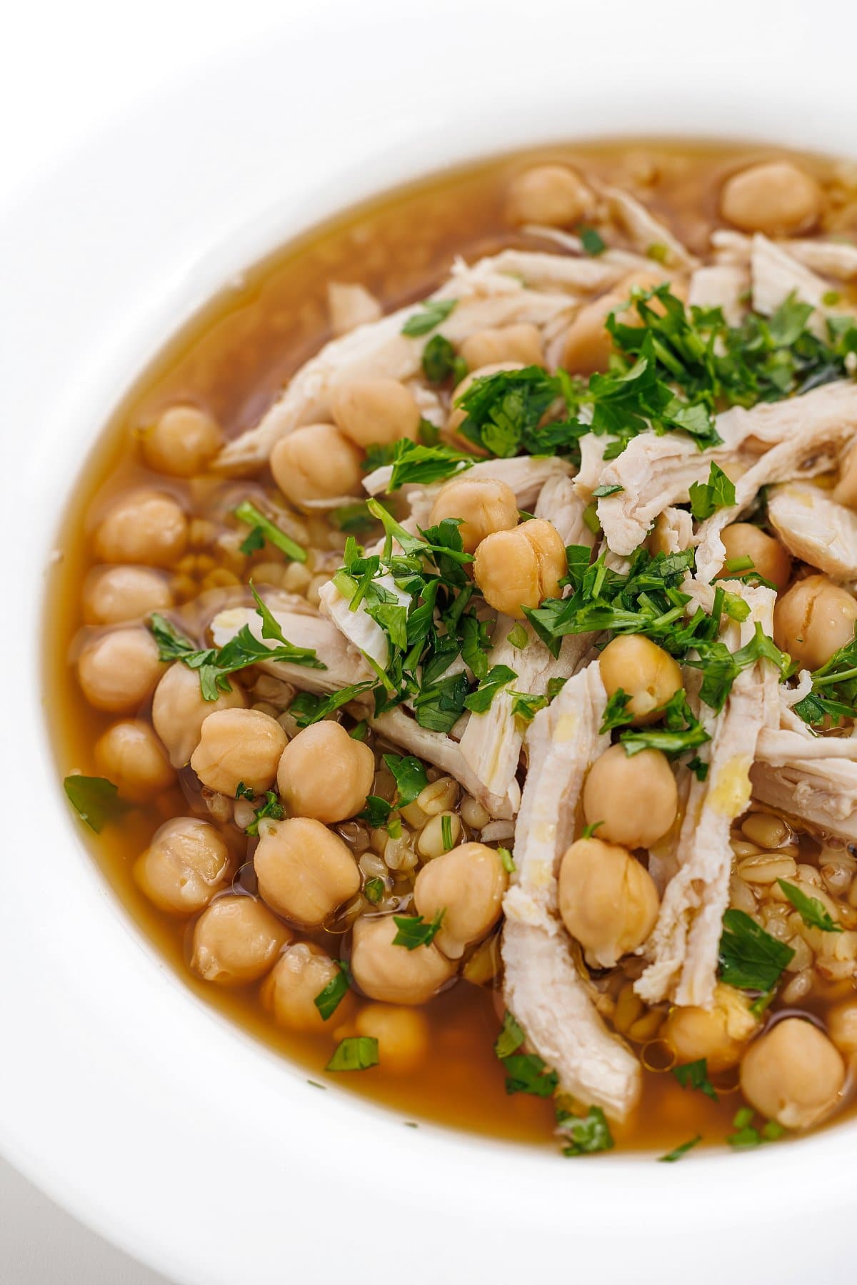 Chicken and chickpea soup with bulgur wheat.
