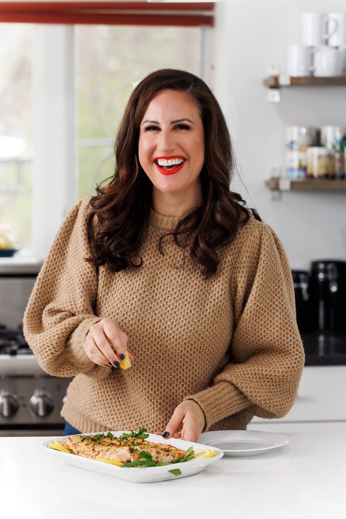 Liz eating baked dijon salmon.