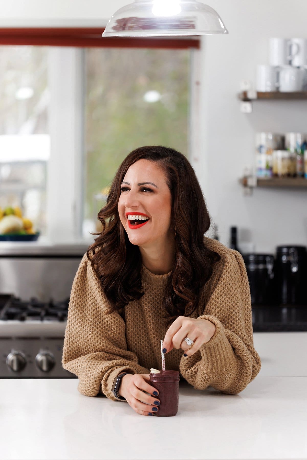 Liz drinking Kale Banana Berry Smoothie