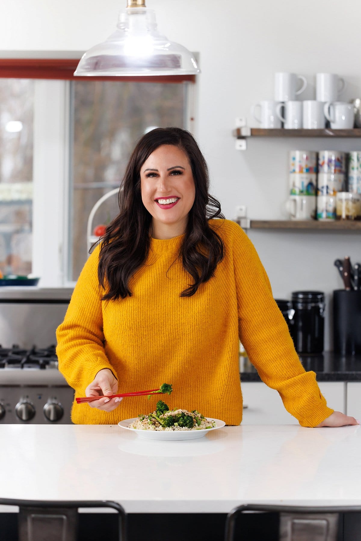 Liz eating brown rice and ground turkey  stir fry.