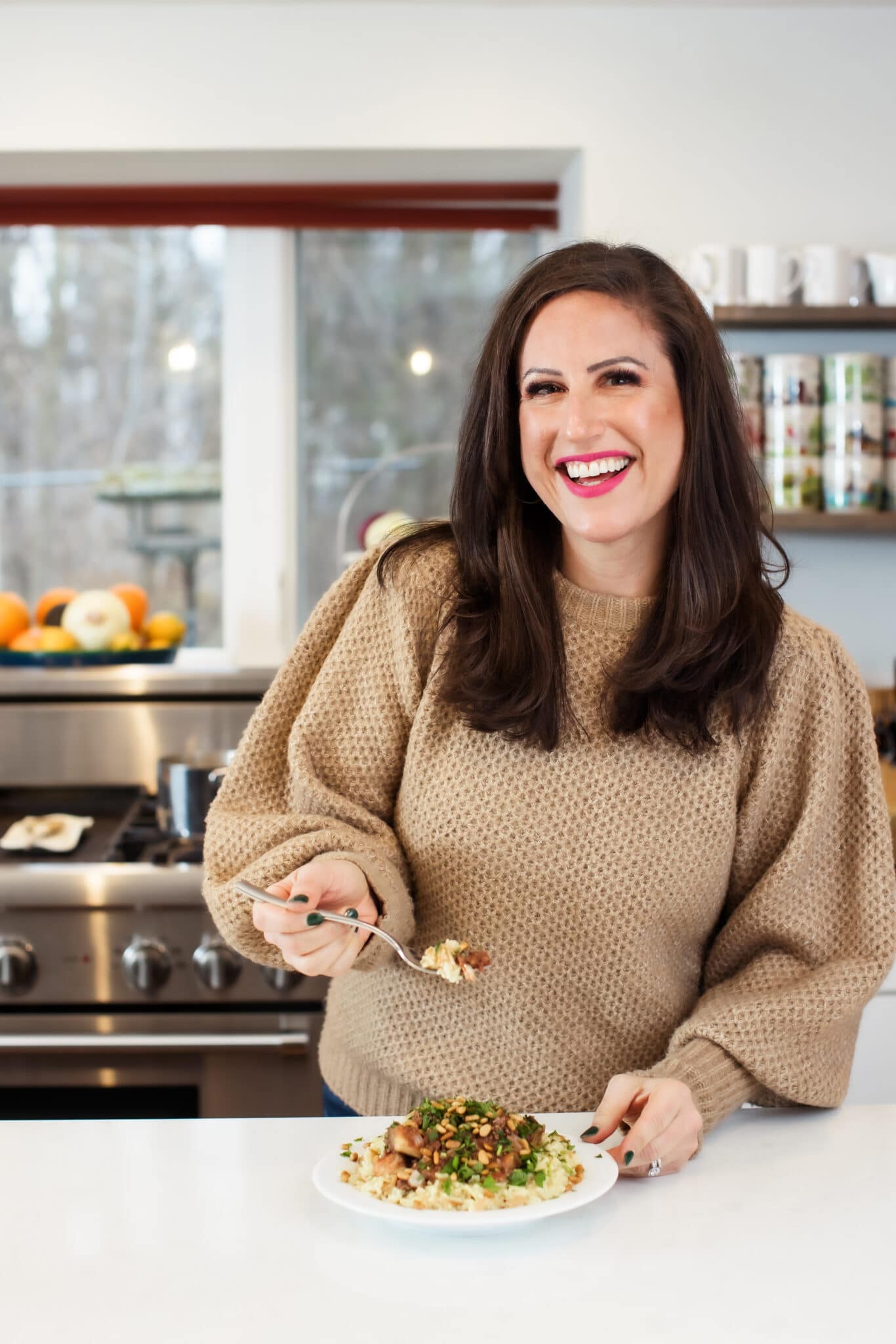 Liz eating Lebanese Hushwee Rice.