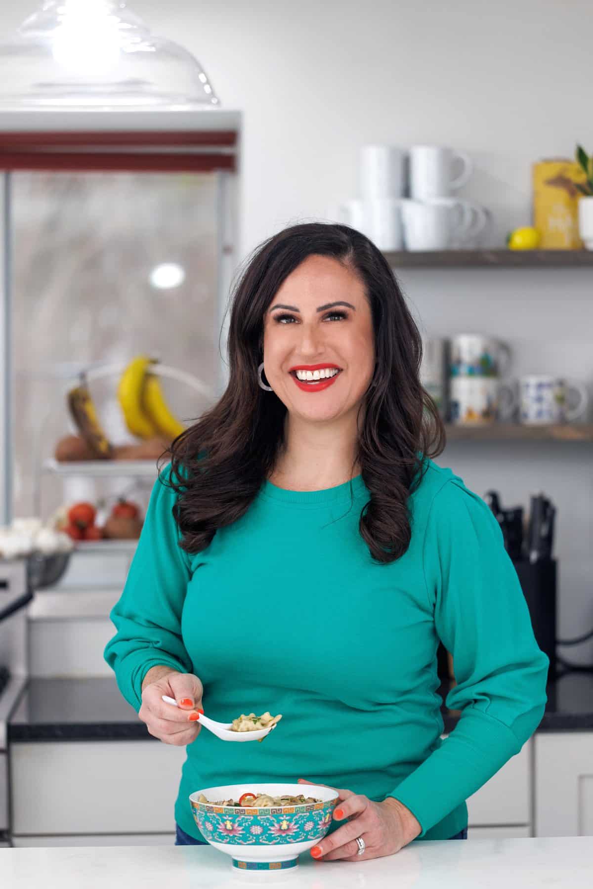 Liz eating easy 5 minute wonton soup.