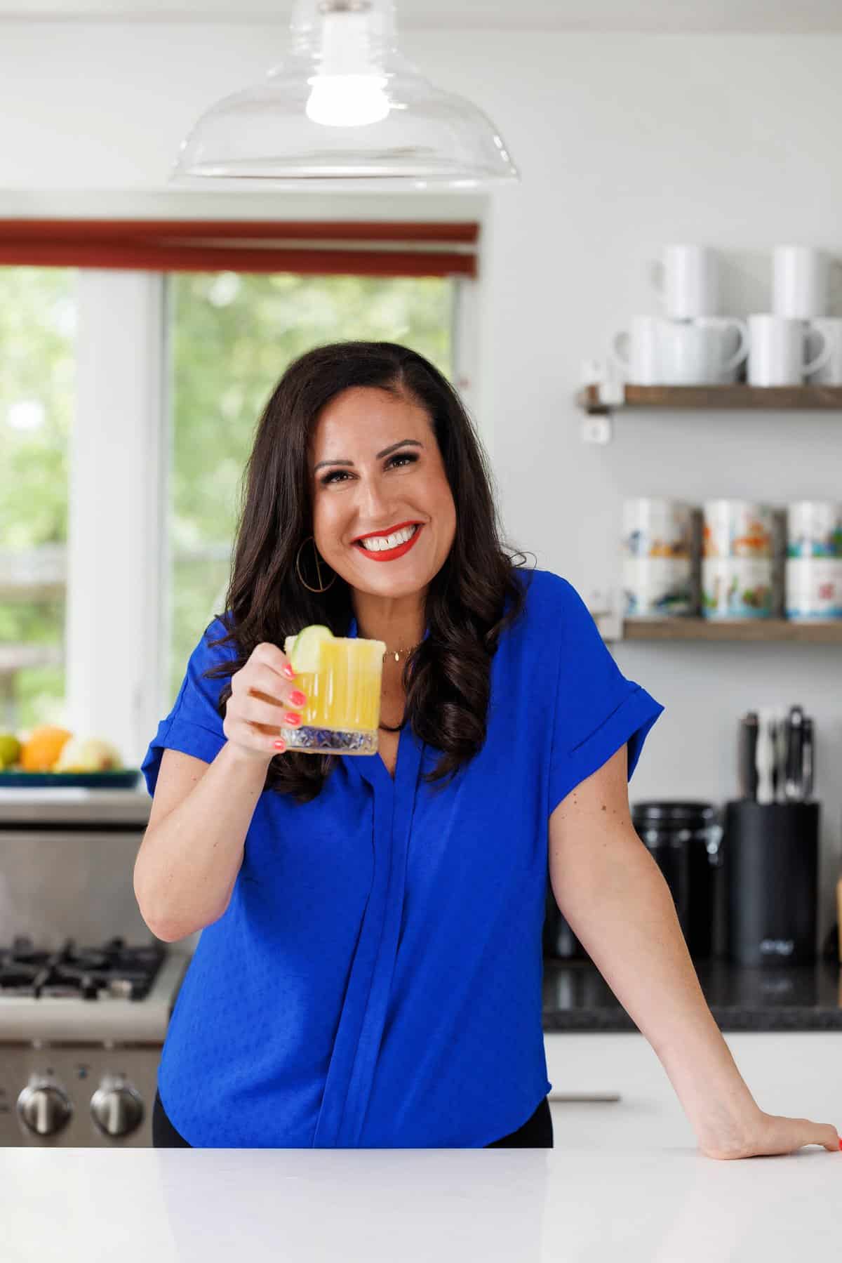 Liz drinking spicy jalapeño margaritas.