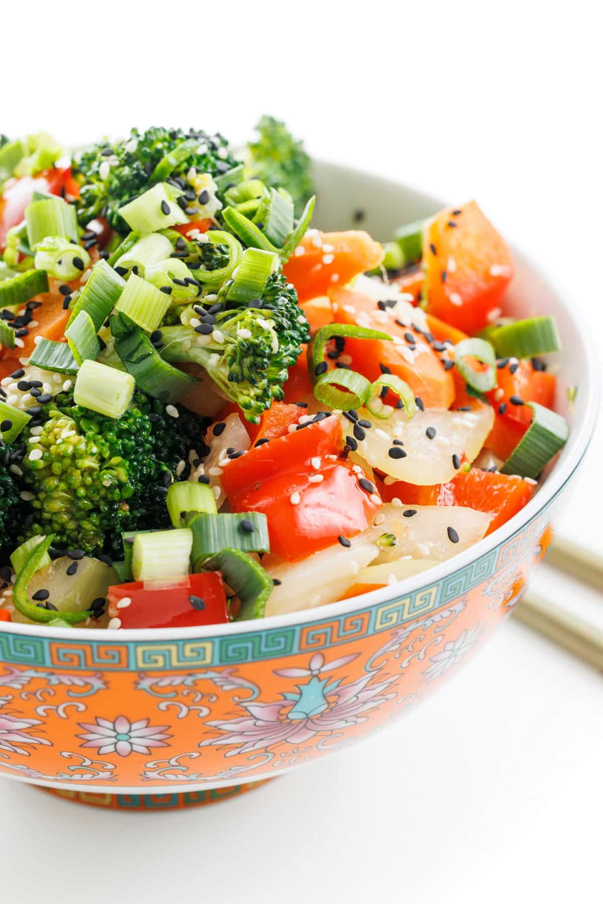 Mixed vegetable stir-fry in a detailed bowl.