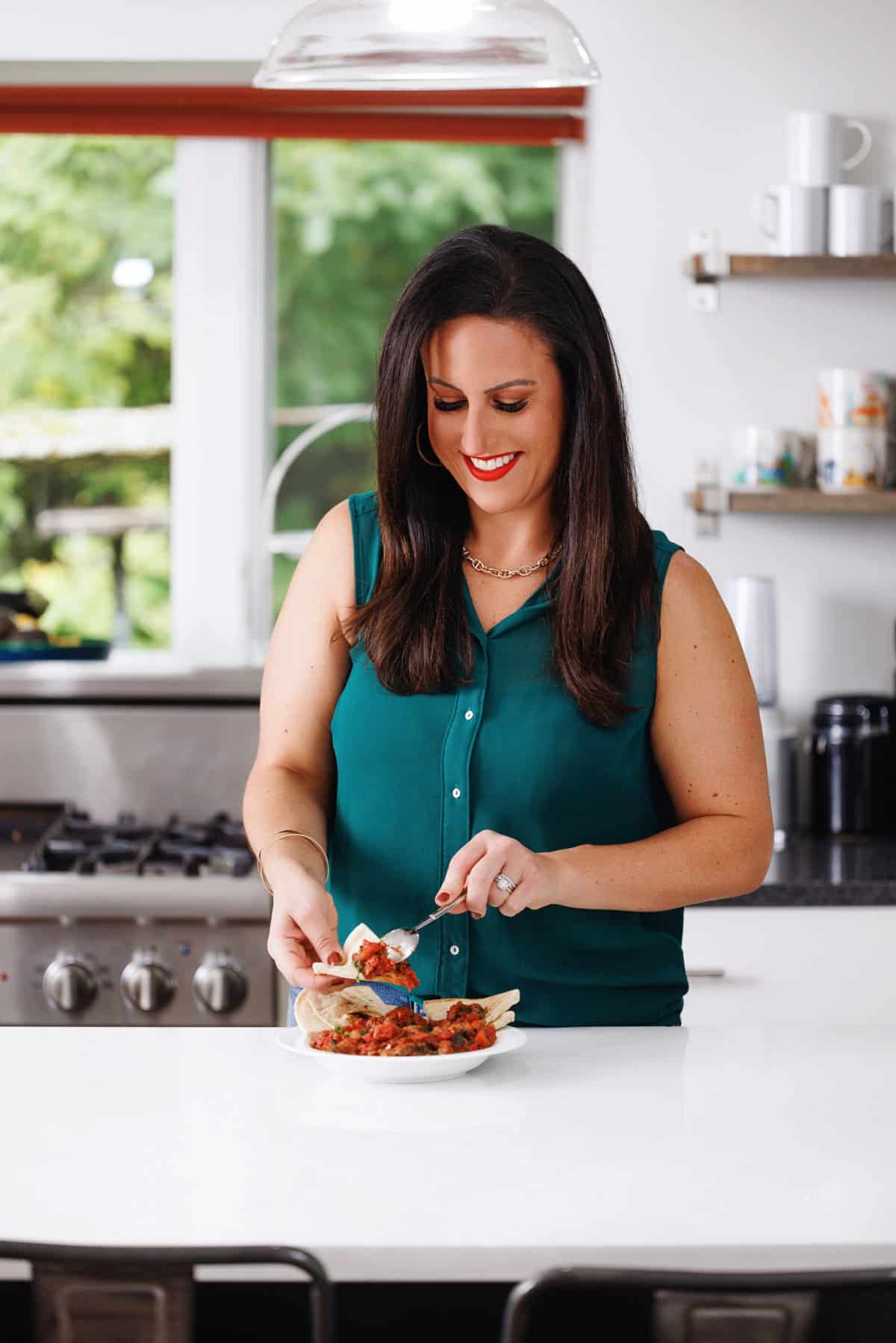 Liz eating Turkish eggplant salsa.