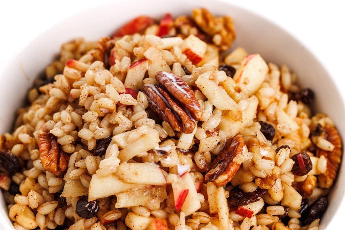 Barley breakfast bowl with fruit and nuts.