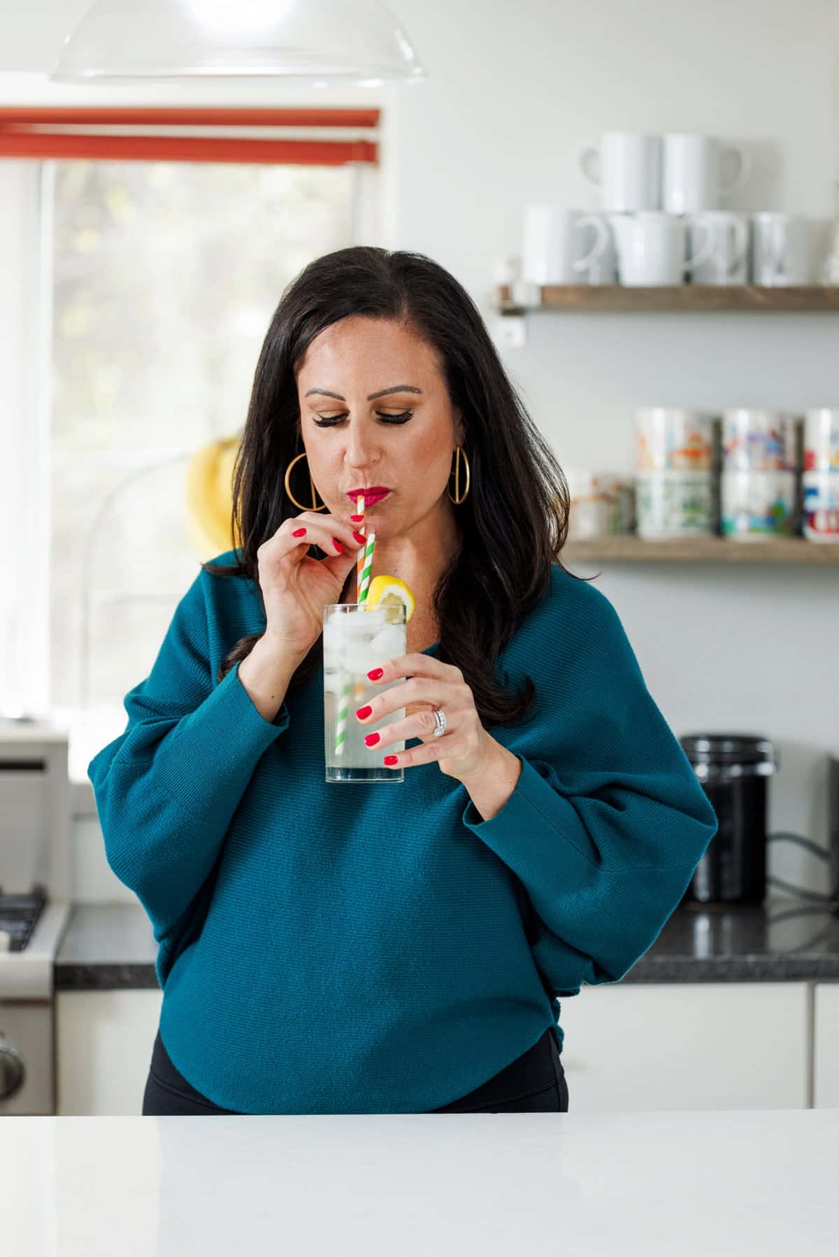 Liz enjoying orange blossom lemonade.