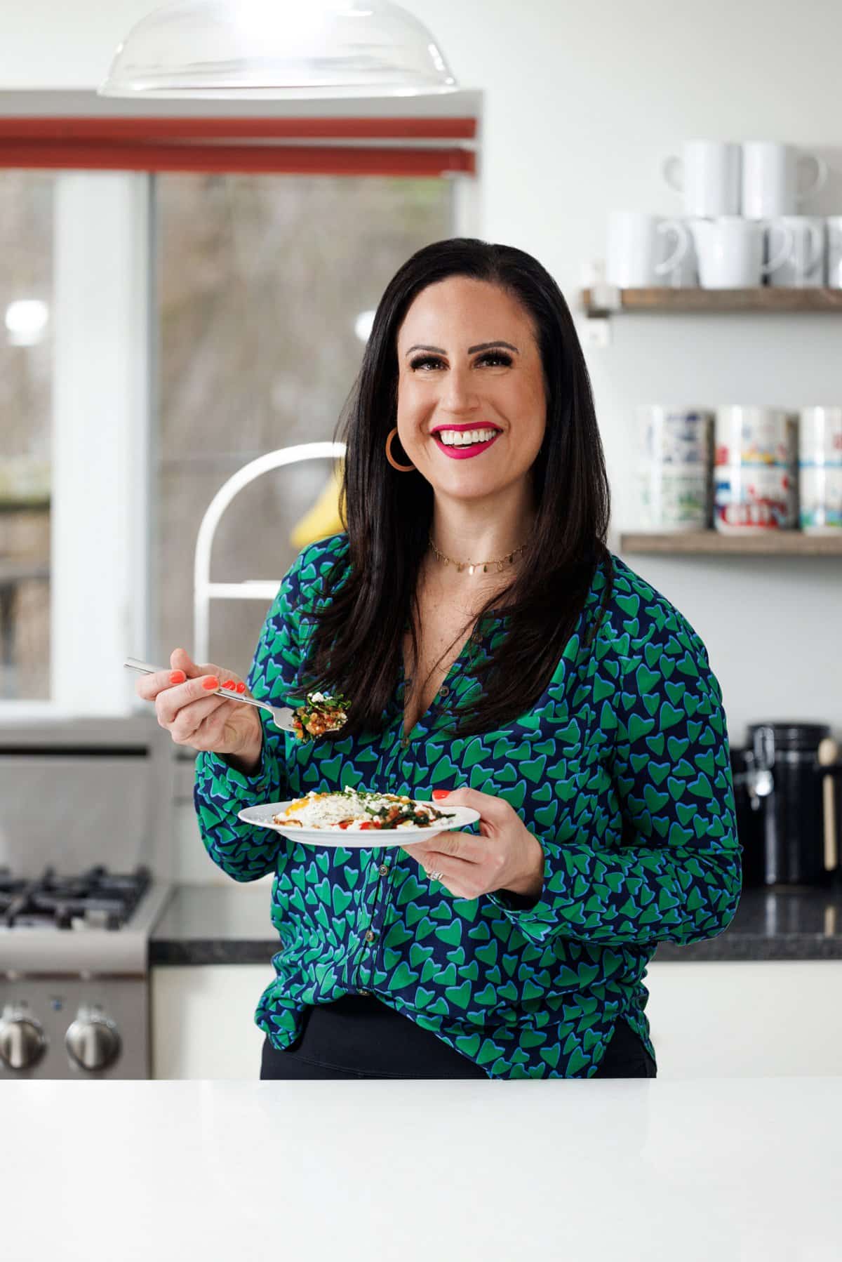 Liz eating Greek breakfast egg skillet.