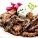 a plate of meat and vegetables