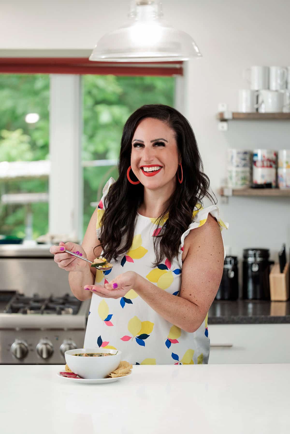 Liz eating chicken poblano soup with corn.