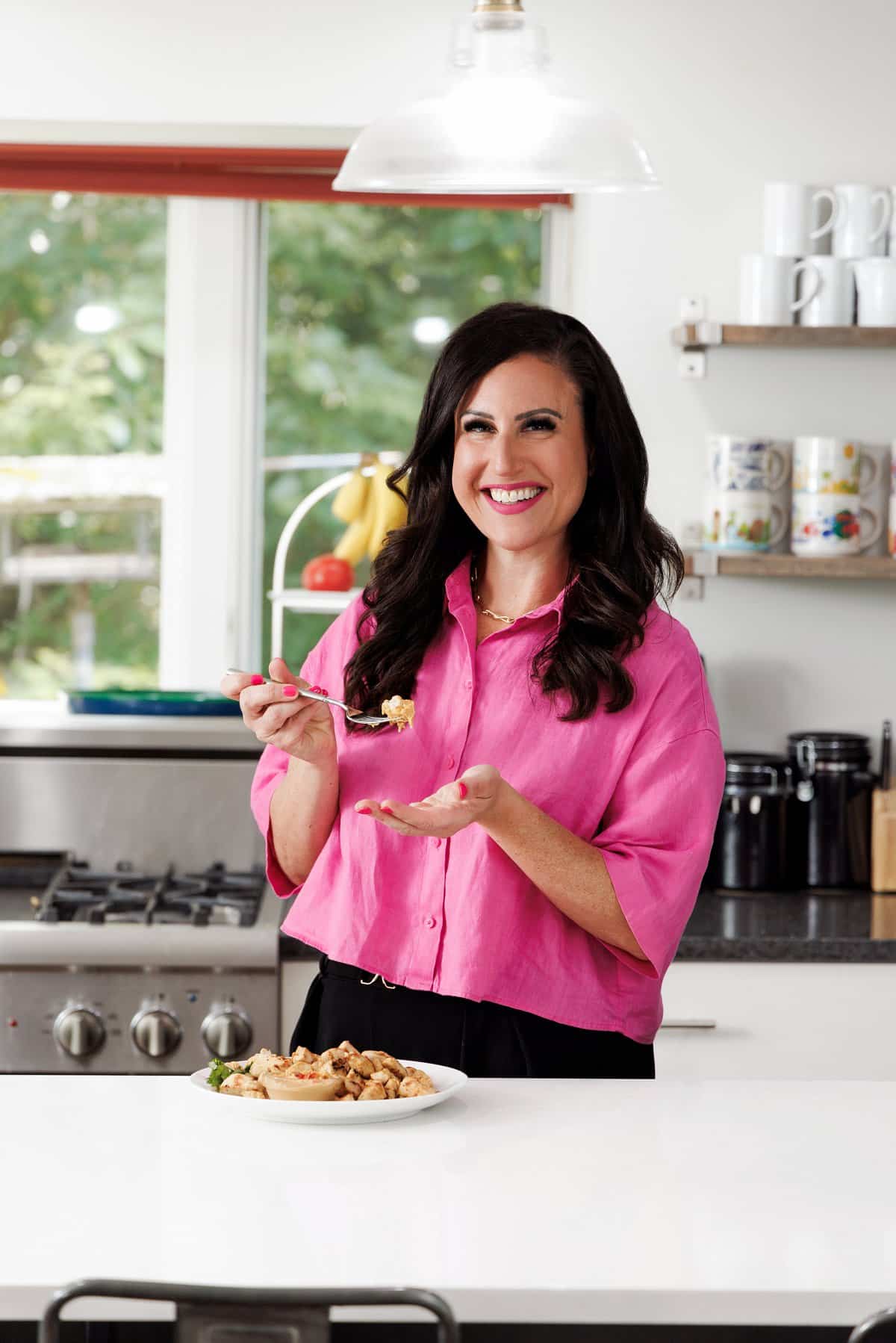 Liz eating Lebanese shish tawook chicken.