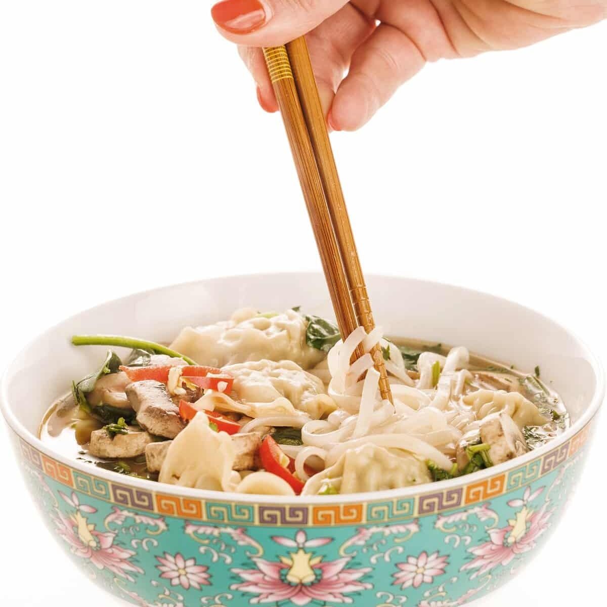 Chopsticks picking up easy 5 minute wonton soup.