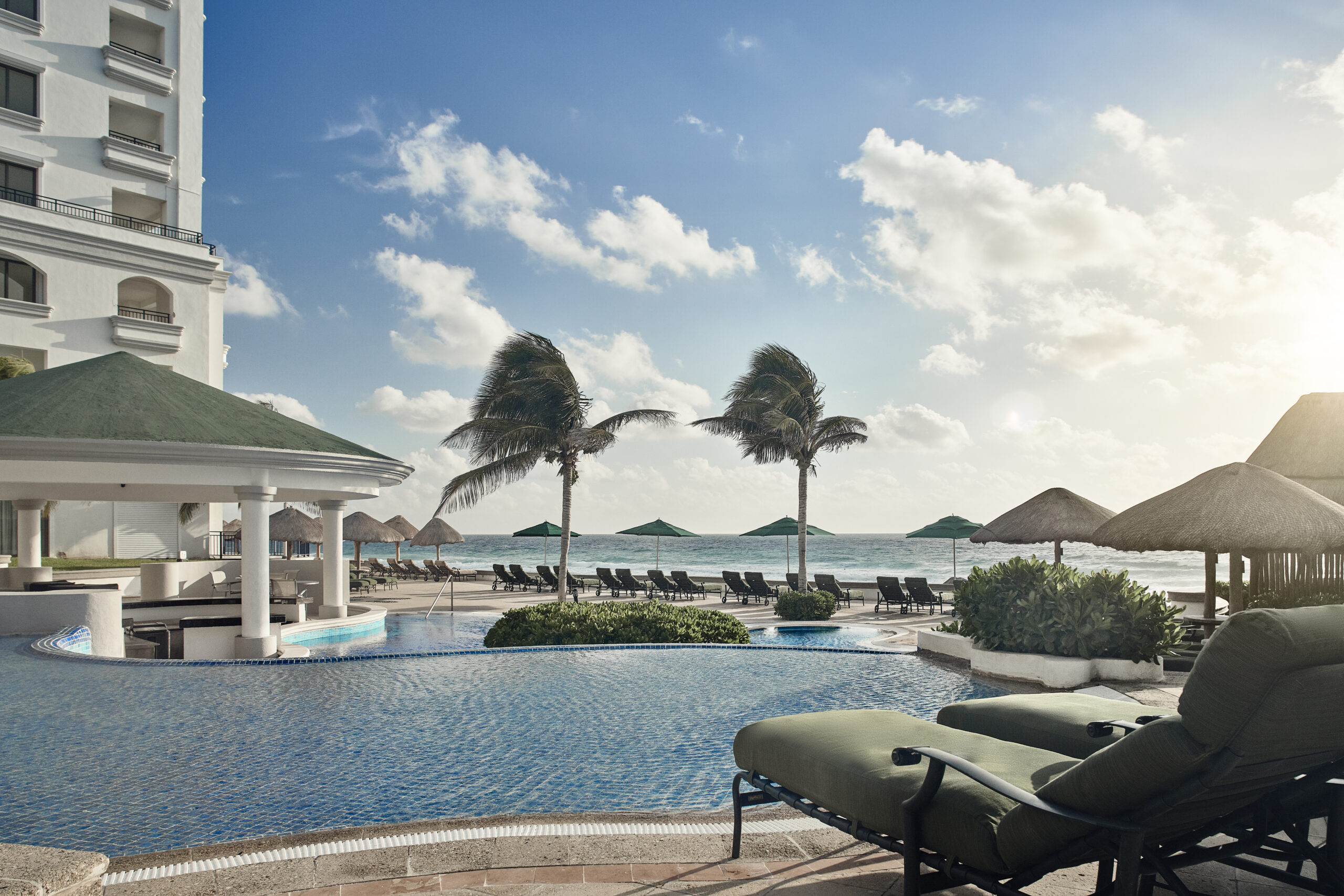 The adult pool with lounge chairs at the JW Marriott Cancun.